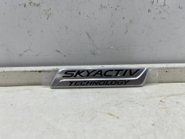 Znaczek Mazda CX-5 II CX5 II 17r.- Emblemat Skyactiv Technology napis na klapę NOWY 110x21mm. ORYGNALNY kb7w-51-771