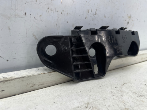 Ślizg Mazda CX-5 I 12-17r.- prawe przednie mocowanie wspornik uchwyt zderzaka kd45500t1 Ślizg Mazda CX-5 I 12-17r.- prawe przednie mocowanie wspornik uchwyt zderzaka kd45500t1