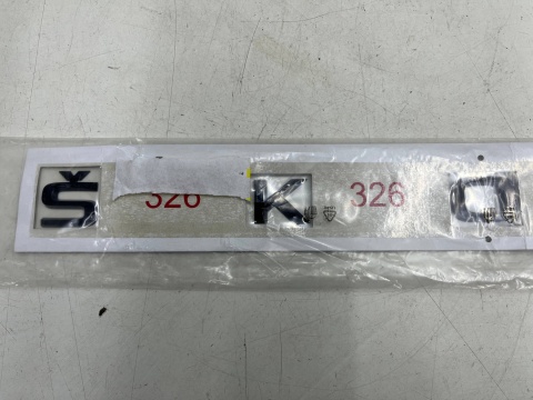 Znaczek Skoda Kodiaq I LIFT 19-24r. NOWY napis znaczek emblemat na klapę bagażnika ORYGNALNY 565853687g Znaczek Skoda Kodiaq I LIFT 19-24r. NOWY napis znaczek emblemat na klapę bagażnika ORYGNALNY 565853687g