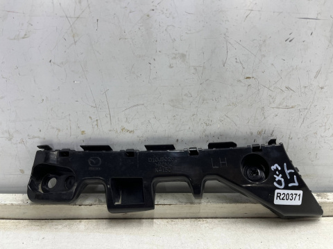 Ślizg Mazda CX-3 CX3 14-21r. lewe tylne mocowanie wspornik uchwyt zderzaka lewy tył d10j502j1 Ślizg Mazda CX-3 CX3 14-21r. lewe tylne mocowanie wspornik uchwyt zderzaka lewy tył d10j502j1