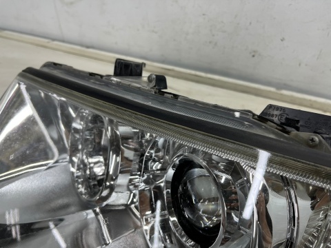 Lampa reflektor Mitsubishi L200 LIFT 10-15r. Pajero Sport II 03-16r. LEWA przednia soczewka lewy przód EUROPA 8301a877 Lampa reflektor Mitsubishi L200 LIFT 10-15r. Pajero Sport II 03-16r. LEWA przednia soczewka lewy przód EUROPA 8301a877