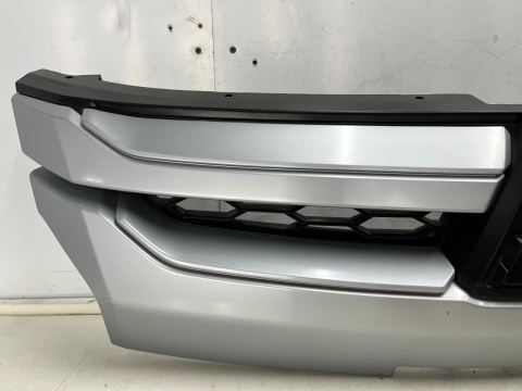Atrapa Mitsubishi L200 5 V 19r.- grill przednia maskownica zderzaka znaczek 7450B291ZZ Atrapa Mitsubishi L200 5 V 19r.- grill przednia maskownica zderzaka znaczek 7450B291ZZ