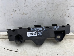 Ślizg Mazda 2 DE 07-14r. prawe przednie mocowanie wspornik uchwyt zderzaka prawy przód d01n500t1