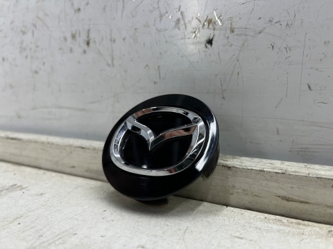 Kołpak Mazda dekielek zaślepka felgi aluminiowej 57 mm. oryginalny bbm237190 Kołpak Mazda dekielek zaślepka felgi aluminiowej 57 mm. oryginalny bbm237190