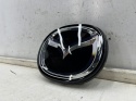 Znaczek Mazda 3 IV BP 19r.- CX-30 znaczek atrapy zderzaka emblemat pod radar na grill logo 12,5x15,5cm. ORYGNALNY bckb-51730
