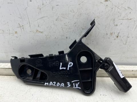 Ślizg Mazda 3 IV BP 19r.- HB 5Drzwi lewe przednie mocowanie zderzaka wspornik błotnika lewy przód bckn500u1 Ślizg Mazda 3 IV BP 19r.- HB 5Drzwi lewe przednie mocowanie zderzaka wspornik błotnika lewy przód bckn500u1
