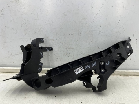 Ślizg Audi A4 B8 07-11r. LEWE przednie mocowanie reflektora okular wspornik pasa pod lampę lewy przód 8k0805607l