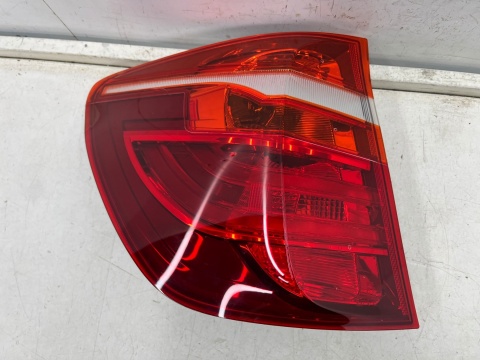 Lampa BMW X3 F25 10-17r. LEWA tylna w błotnik LED oryginalna lewy tył EUROPA 7217311 Lampa BMW X3 F25 10-17r. LEWA tylna w błotnik LED oryginalna lewy tył EUROPA 7217311