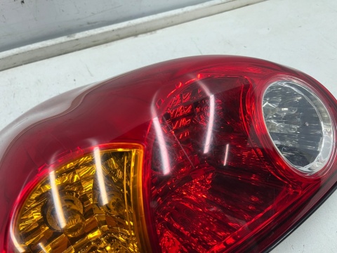 Lampa Mitsubishi L200 KA KB 05-15r. PRAWA tylna w błotnik oryginalna prawy tył EUROPA