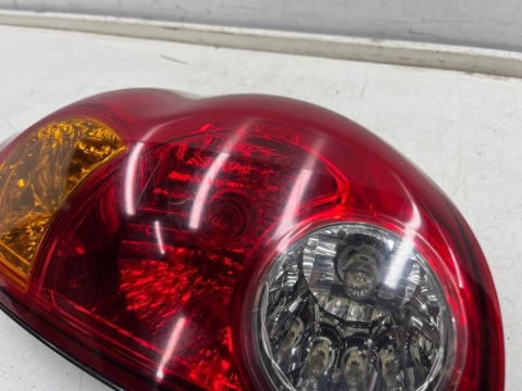 Lampa Mitsubishi L200 KA KB 05-15r. PRAWA tylna w błotnik oryginalna prawy tył EUROPA