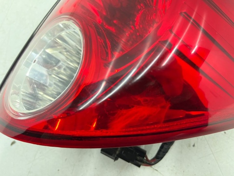 Lampa Mitsubishi L200 KA KB 05-15r. PRAWA tylna w błotnik oryginalna prawy tył EUROPA