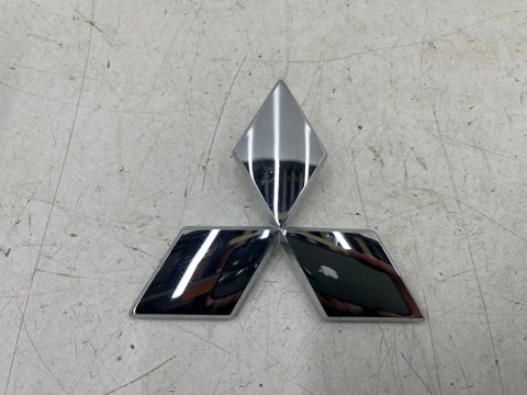 Znaczek Mitsubishi Colt VI 6 Z30 04-12r. NOWY znaczek emblemat na przedni zderzak w atrapę przód ORYGNALNY 6407a069