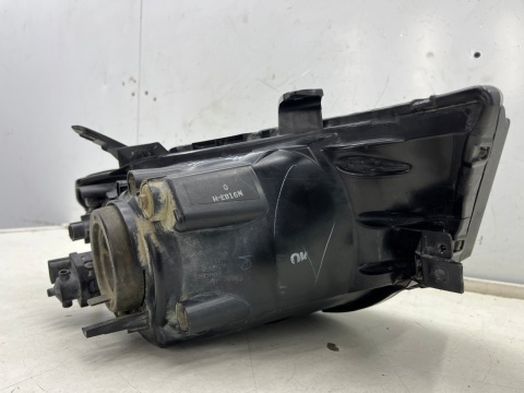 Lampa reflektor Mitsubishi L200 KA KB 05-10r. LEWA przednia H4 oryginalna lewy przód EU 8301b461