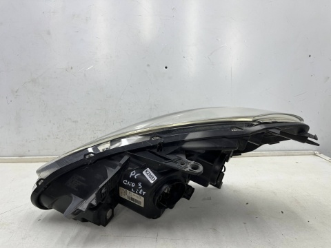 Lampa reflektor Renault Clio 3 III Lift 09-15r. prawa przednia zwykła prawy przód Europa oryginalna 8200892495