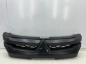 Atrapa Mitsubishi L200 5 V 19r.- grill przednia maskownica zderzaka znaczek 7450B264