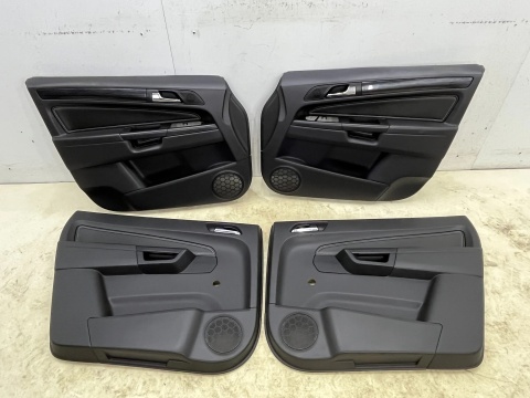 Tapicerka Opel Zafira B 05-14r. boczki drzwi skórzane dekory podświetlane klamki KOMPLET