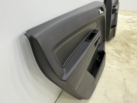 Tapicerka Opel Zafira B 05-14r. boczki drzwi skórzane dekory podświetlane klamki KOMPLET
