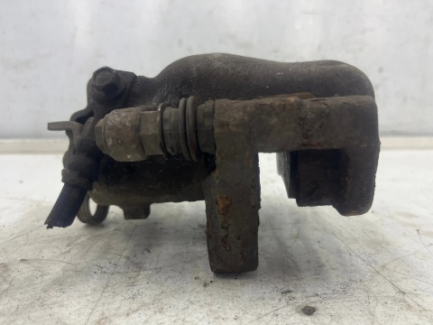 Zacisk hamulcowy Opel Zafira B 05-14r. lewy tył