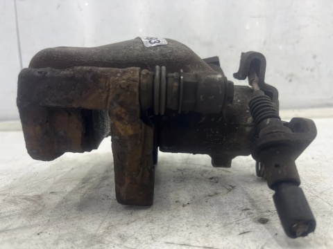 Zacisk hamulcowy Opel Zafira B 05-14r. lewy tył