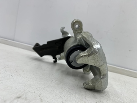 Zacisk hamulcowy Nissan Almera N16 Almera Tino Primera P11 96-06r. NOWY lewy tylny zacisk lewy tył