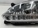 Lampa reflektor Hyundai Santa Fe 3 III 12-15r. lewy przedni halogen LED w zderzak oryginalny DRL 922012w110