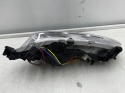Lampa reflektor Hyundai Santa Fe 3 III 12-15r. lewy przedni halogen LED w zderzak oryginalny DRL 922012w110