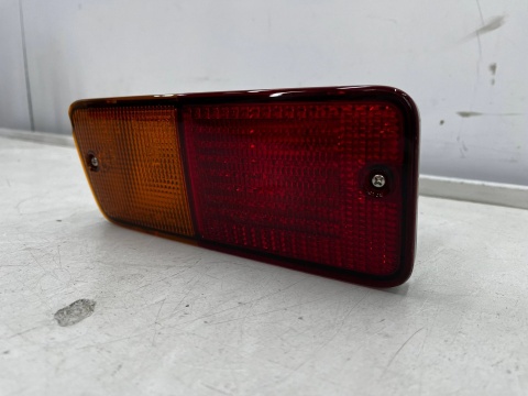 Lampa Nissan Patrol 5 V Y61 91-13r. LEWA tylna przeciwmgielna kierunkowskaz w zderzak halogen oryginalna LEWY tył 26555-vb11b