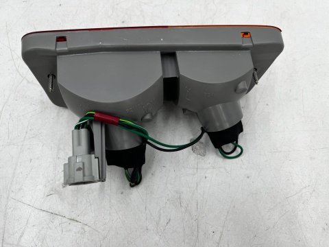 Lampa Nissan Patrol 5 V Y61 91-13r. LEWA tylna przeciwmgielna kierunkowskaz w zderzak halogen oryginalna LEWY tył 26555-vb11b