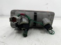 Lampa Nissan Patrol 5 V Y61 91-13r. LEWA tylna przeciwmgielna kierunkowskaz w zderzak halogen oryginalna LEWY tył 26555-vb11b