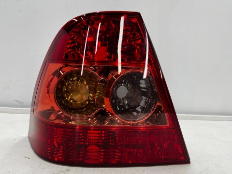 Lampa Toyota Corolla IX E12 SEDAN 04-07r. Lift NOWA lewa tylna EU Oryginalna w błotnik lewy tył 81561-02260