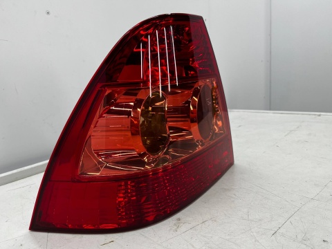 Lampa Toyota Corolla IX E12 SEDAN 04-07r. Lift NOWA lewa tylna EU Oryginalna w błotnik lewy tył 81561-02260