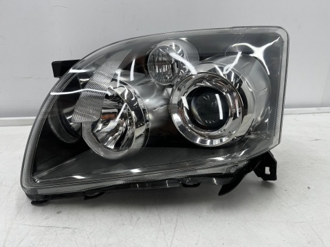 Lampa reflektor Toyota Avensis 2 II T25 LIFT 06-09r. lewa przednia EU H7 soczewka lewy przód 81170-05240