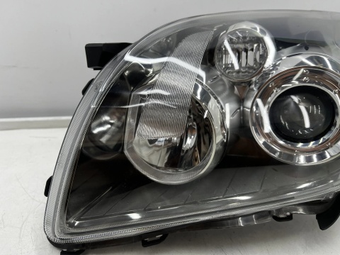 Lampa reflektor Toyota Avensis 2 II T25 LIFT 06-09r. lewa przednia EU H7 soczewka lewy przód 81170-05240