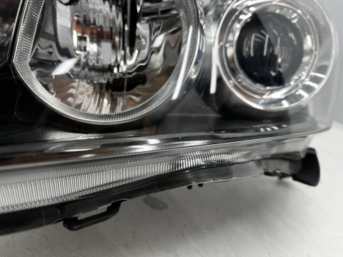 Lampa reflektor Toyota Avensis 2 II T25 LIFT 06-09r. lewa przednia EU H7 soczewka lewy przód 81170-05240