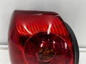 Lampa Toyota Avensis 2 II T25 LIFT 06-09r. HB sedan NOWA lewa tylna EU Oryginalna w błotnik lewy tył 81561-05130