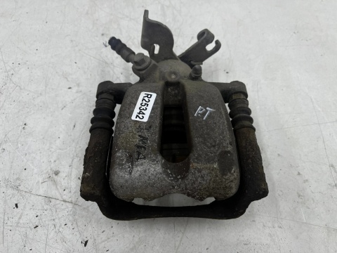 Zacisk hamulcowy Opel Insignia A 08-17r. PRAWY tylni jarzmo prawy tył