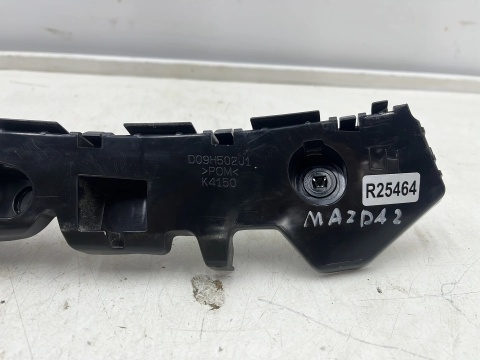 Ślizg Mazda 2 III DJ 14r- lewe przednie mocowanie wspornik uchwyt zderzaka d09h502j1