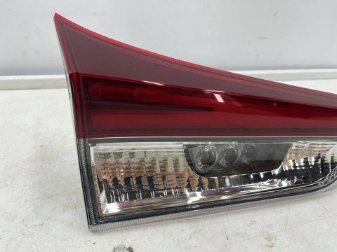 Lampa Toyota Auris II E18 Corolla HB LIFT 15-18r. lewa tylna LED w klapę bagażnika EU Oryginalna nowa 81591-02880
