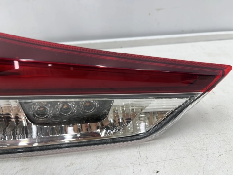 Lampa Toyota Auris II E18 Corolla HB LIFT 15-18r. lewa tylna LED w klapę bagażnika EU Oryginalna nowa 81591-02880