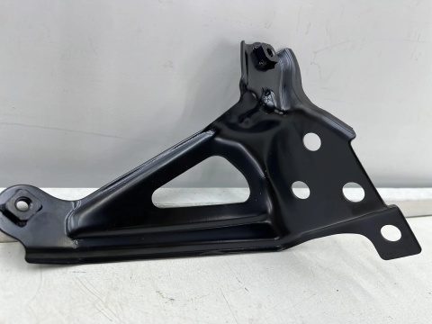 Mocowanie błotnika Toyota Corolla E21 18r.- lewe przednie wspornik podpora 53836-02040