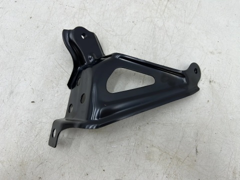 Mocowanie błotnika Toyota Corolla E21 18r.- lewe przednie wspornik podpora 53836-02040