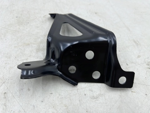 Mocowanie błotnika Toyota Corolla E21 18r.- lewe przednie wspornik podpora 53836-02040