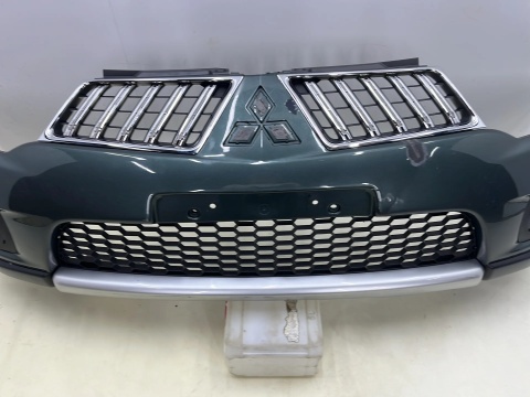 Zderzak przedni Mitsubishi Pajero Sport 2 L200 10-15r. Lift przód 6400B862