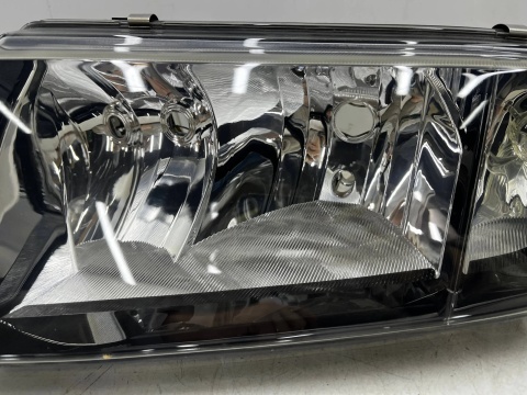 Lampa reflektor Skoda Fabia I 6y 99-08r. LEWA przednia oryginalna EUROPA czarna ramka 6y1941015n