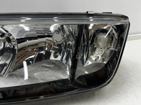Lampa reflektor Skoda Fabia I 6y 99-08r. LEWA przednia oryginalna EUROPA czarna ramka 6y1941015n