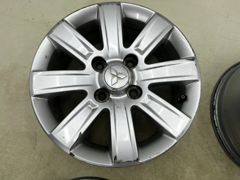 Felgi aluminiowe Mitsubishi Colt VI 6 Z30 04-12r. r15 cali 6jx15 ET46 4x114,3 CH67 felgi oryginalne KOMPLET 4250a756