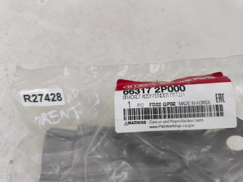Mocowanie błotnika Kia Sorento 2 II 09-14r. NOWA lewa przednia dolna podpora błotnika wspornik 66317-2p000