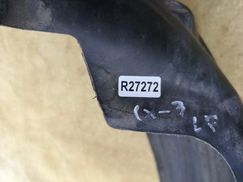 Nadkole Mazda CX-3 CX3 15-21r. LEWE przednie ORYGINALNE d10e-k7016