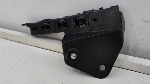 Ślizg Mitsubishi Colt 6 VI 04-12r. lewe przednie mocowanie zderzaka wspornik lewy przód mn105207