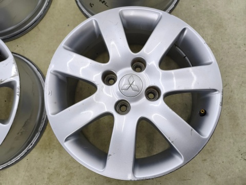 Felgi aluminiowe Mitsubishi Colt VI 6 Z30 04-12r. r16 cali 6,5jx16 ET48 4x114,3 CH67 felgi oryginalne KOMPLET mr594967